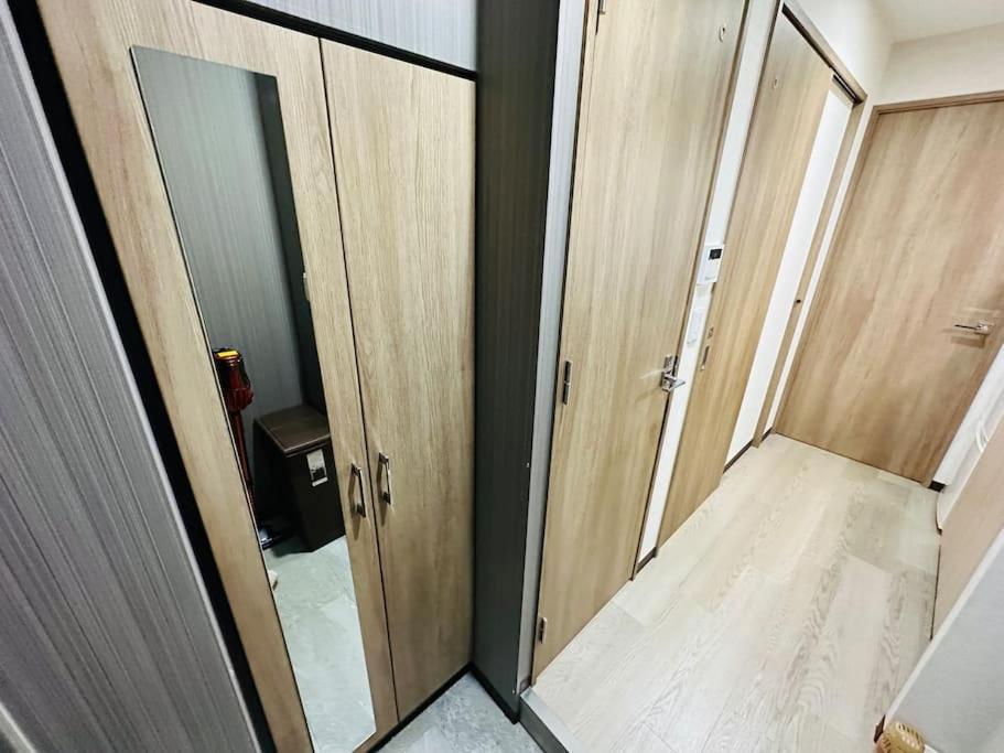 202 黒門市場1分!道頓堀まで徒歩8分!心斎橋まで徒歩9分! Apartment Ōsaka